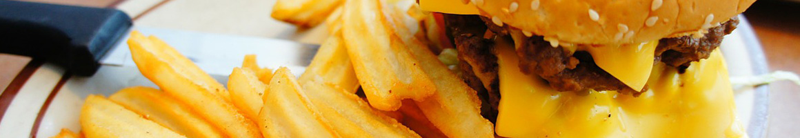 Eating Burger at The Burger House restaurant in Houston, TX.